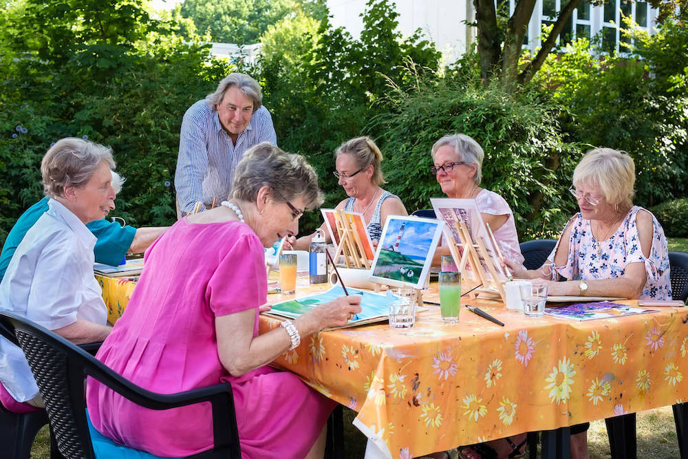 Double Creek | Senior's participating in a group painting activity