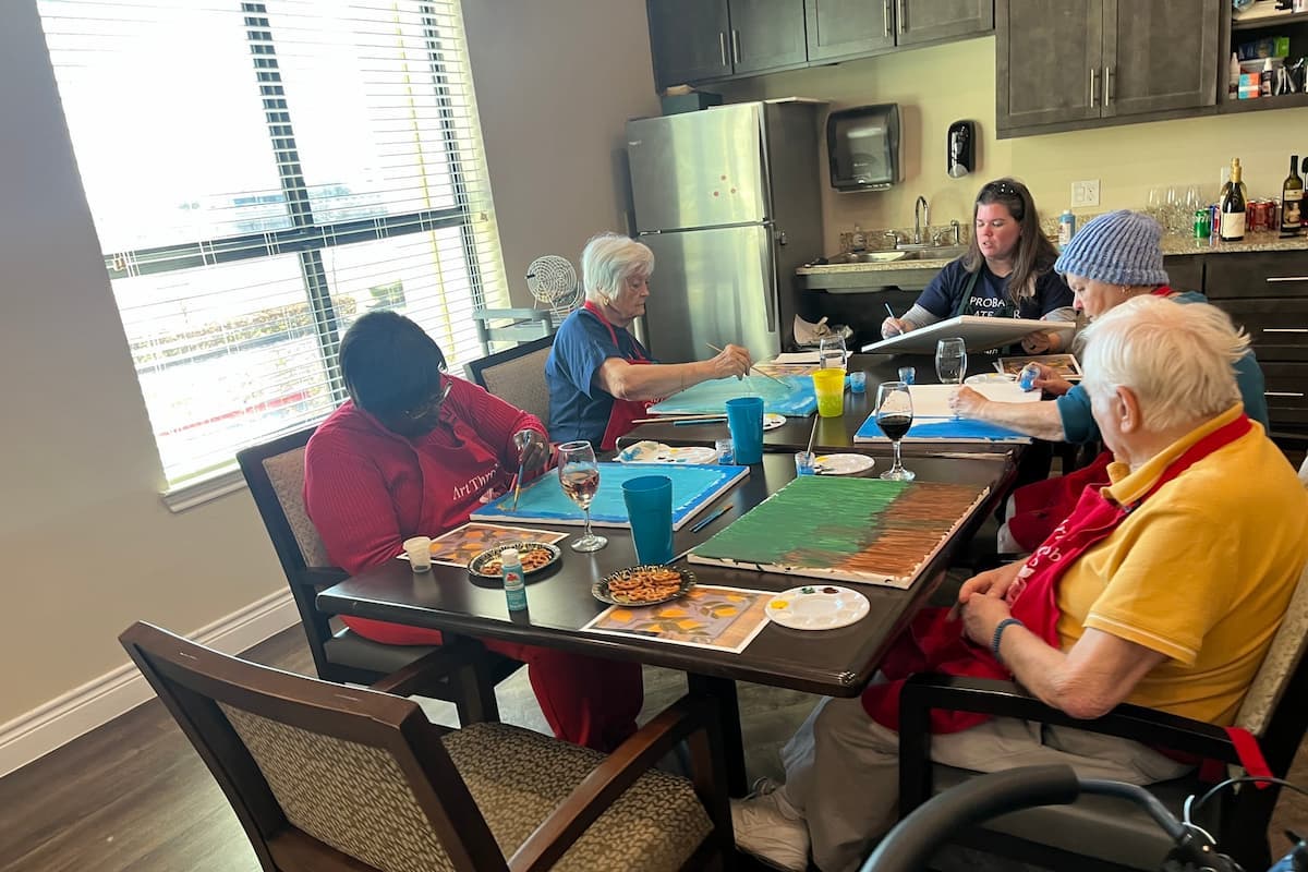 Double Creek Assisted Living | Seniors doing sip and paint activity