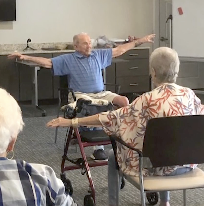Ledgestone Senior Living | Buck teaching yoga