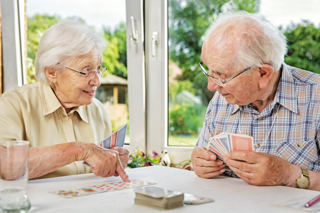 Tech Ridge Oaks | Seniors playing a card game