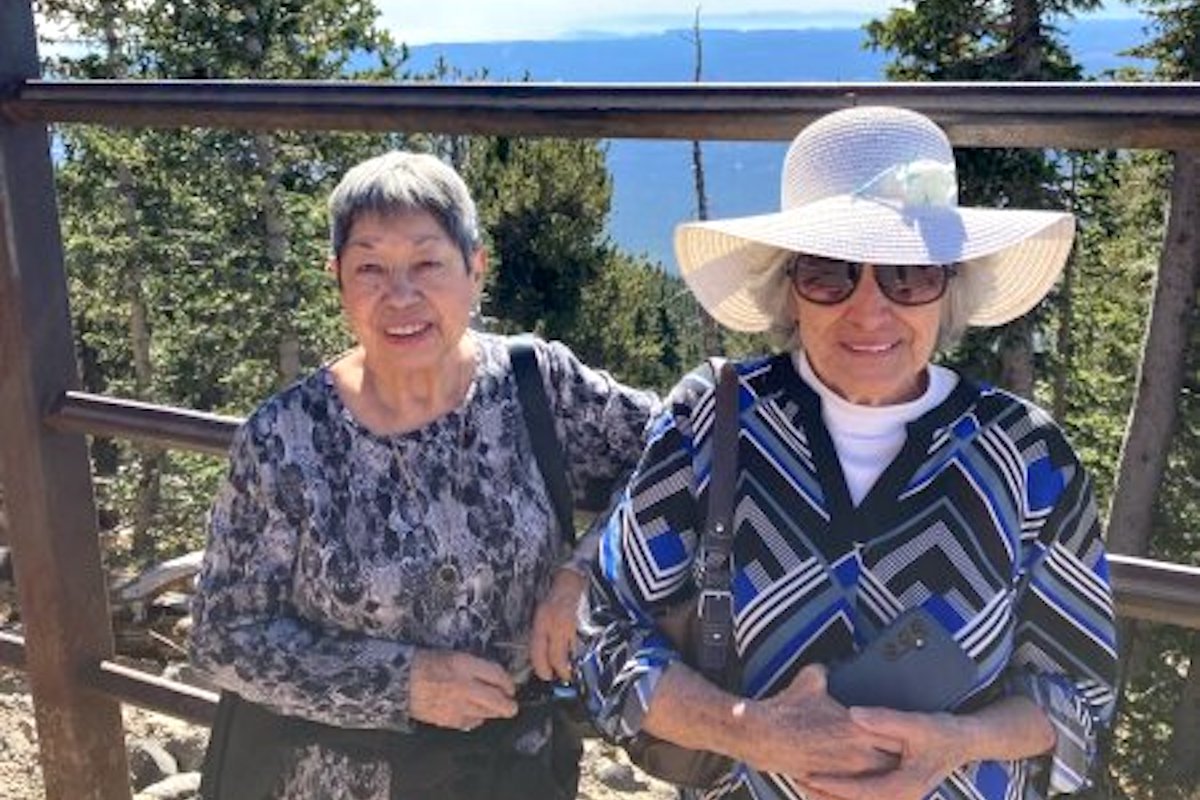 The Bluffs of Flagstaff | Senior community members in front of a scenic view
