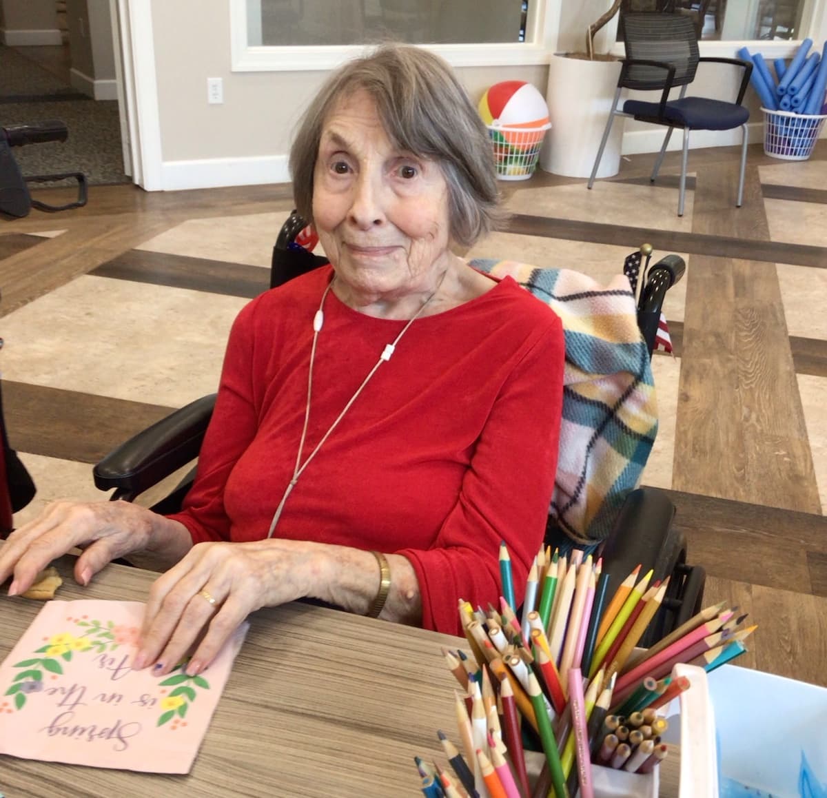 The Grandview of Chisholm Trail | Resident using colored pencils to create art