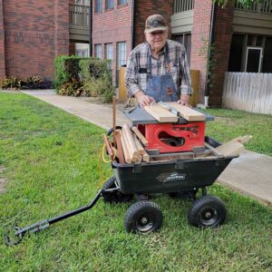 Valley View Senior Living | Senior resident, Jimmy Canville with a wheelbarrow filled with wood