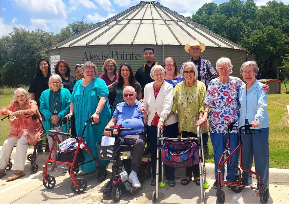 Alexis Pointe of Wimberley | Seniors posing together at a park