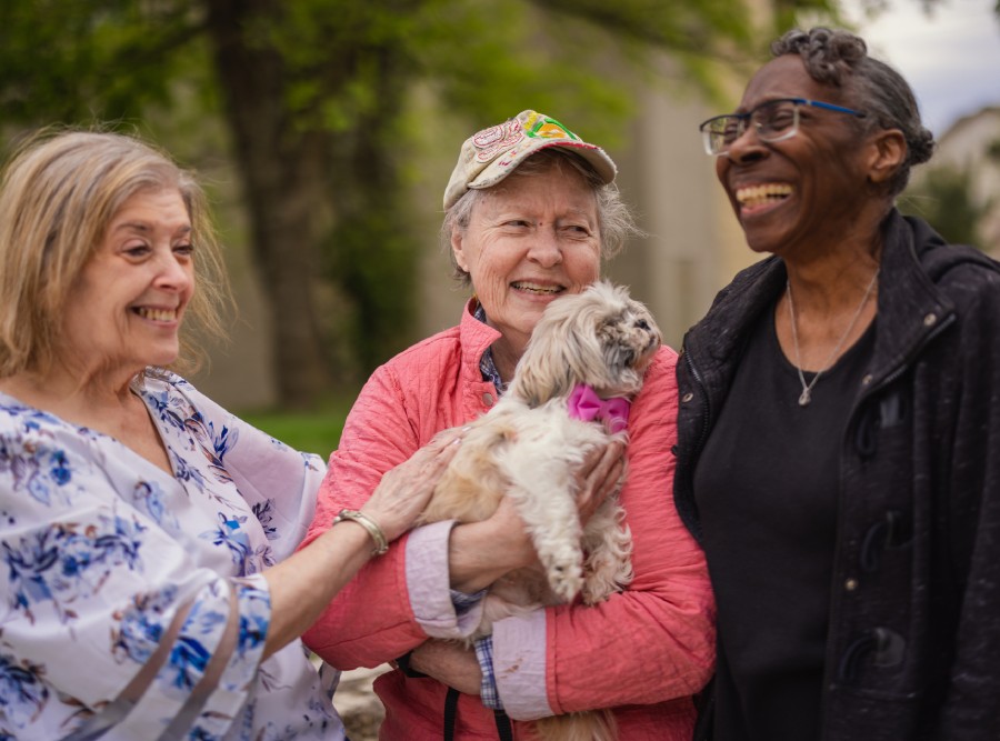 Civitas Senior Living | Seniors walking dog
