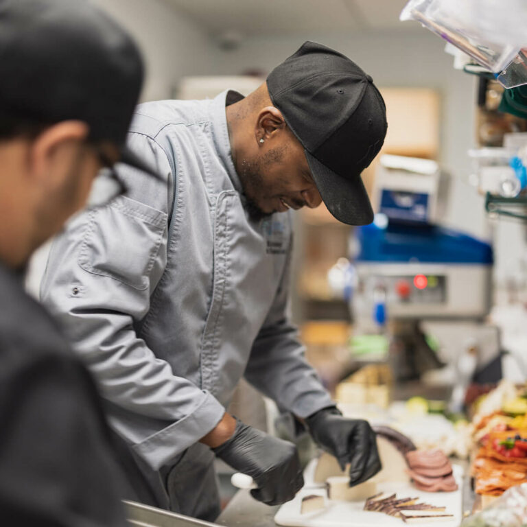 Arabella of Athens | Chef preparing fresh food for residents