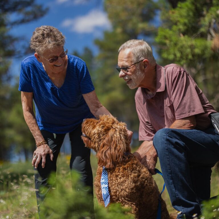 Arabella of Athens | Senior couple walking outside together with dog