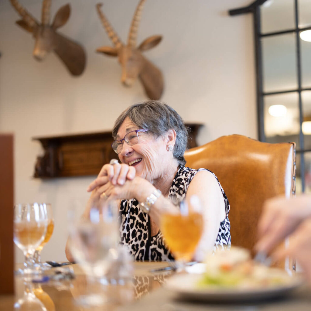 Arabella of Athens | Senior woman dining at table