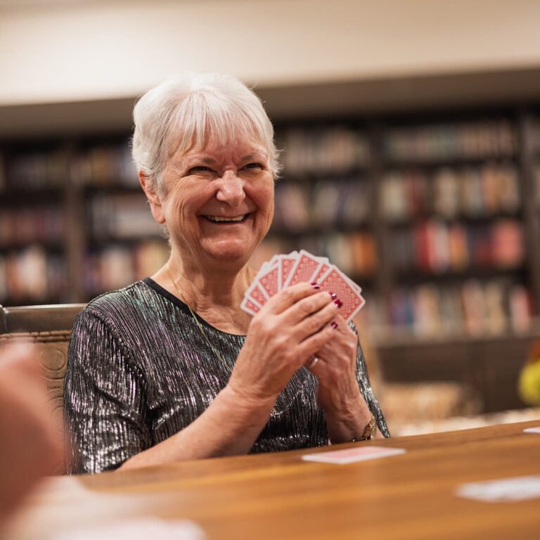Arabella of Athens | Senior woman playing cards