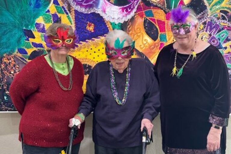 Arabella of Kilgore | Seniors at Mardi Gras party