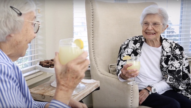 Arabella of Kilgore | Two senior woman drinking lemonade and laughing
