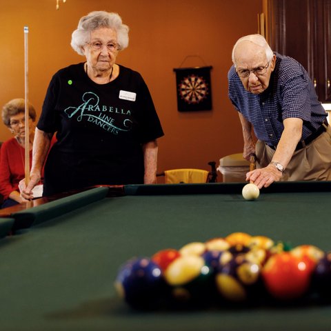 Arabella of Longview | Seniors playing a game of pol