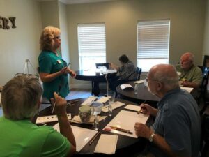 Arabella of Longview | Sarah S. speaking with other residents