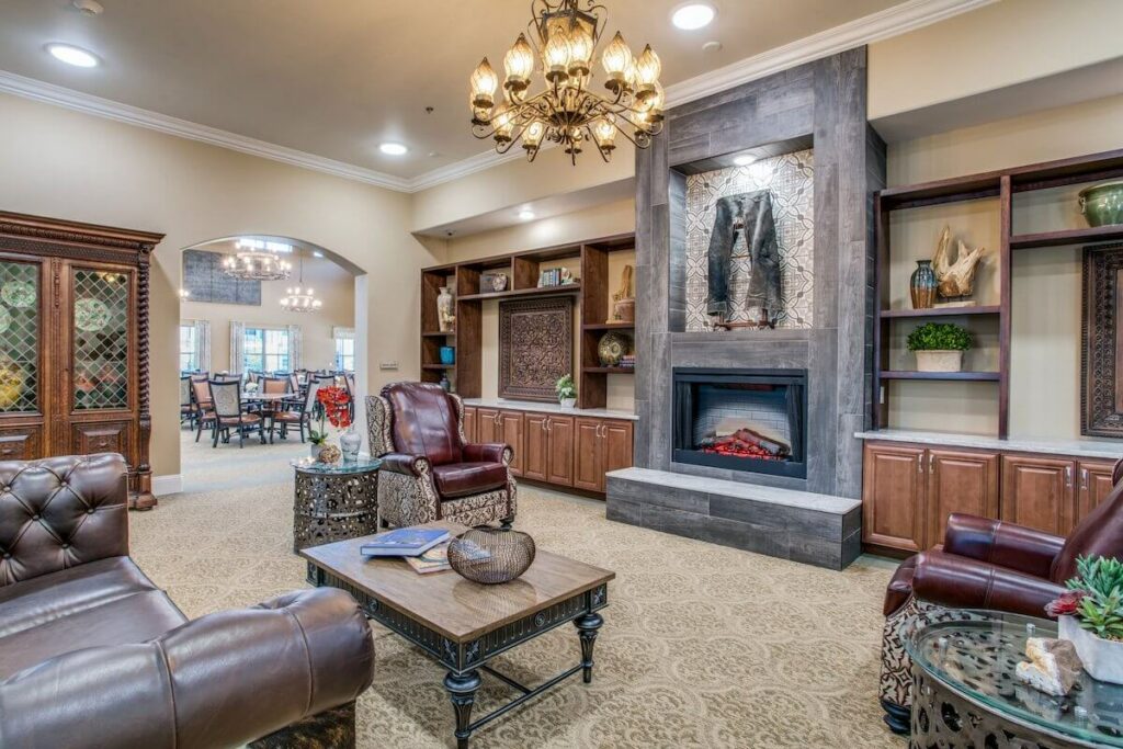 Arabella of Red Oak | Common area with a fireplace