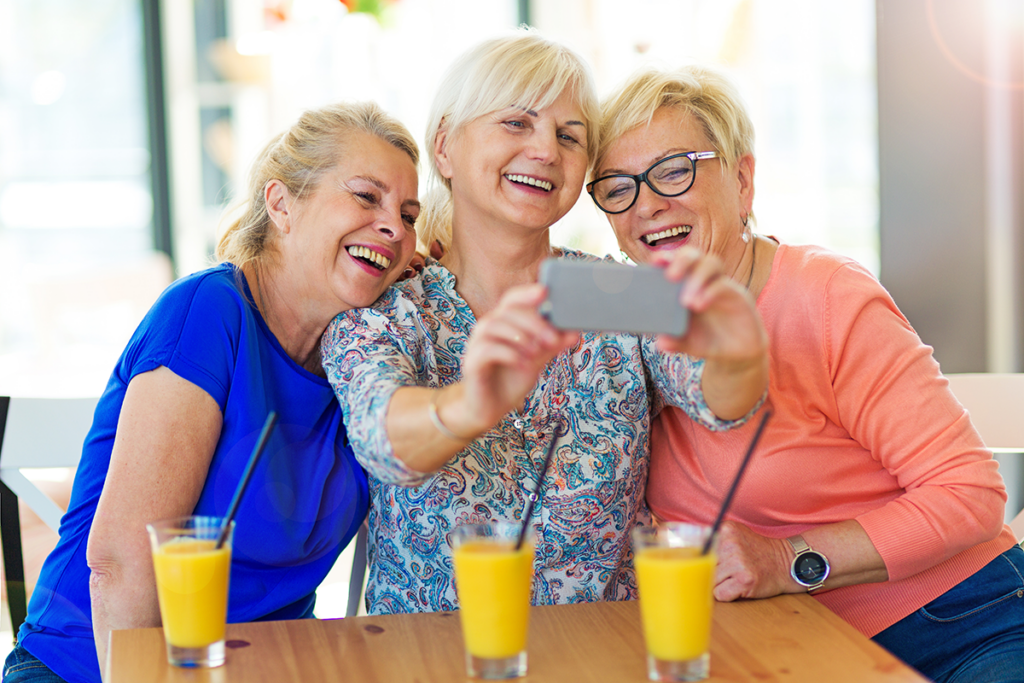 Ariel Pointe of Sachse | Senior women taking group selfie