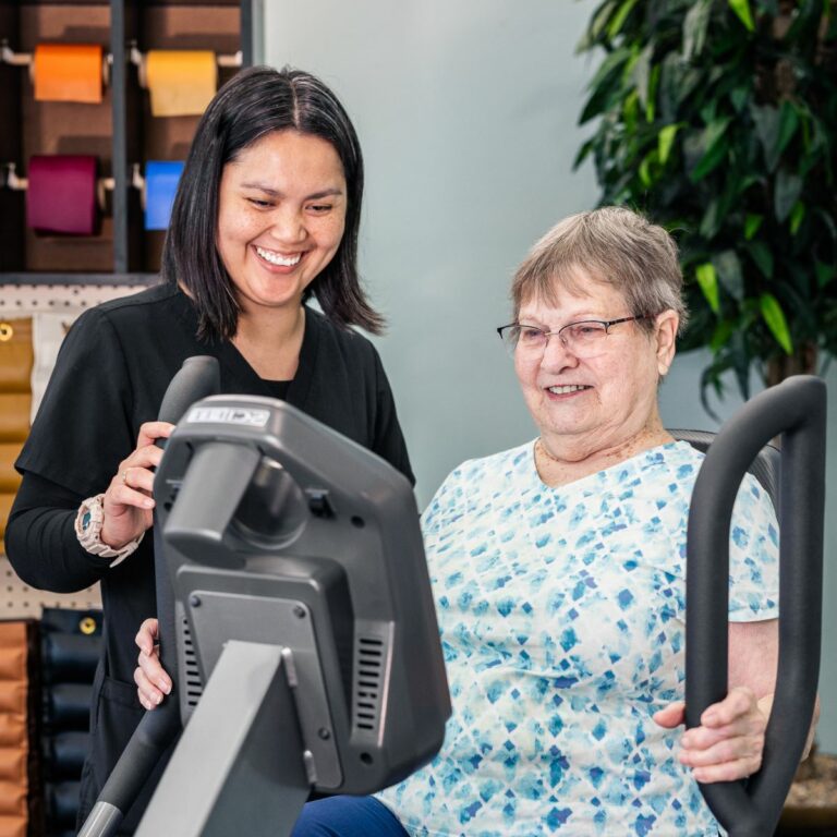 Ariel Pointe of Sachse | Resident exercising with caregiver