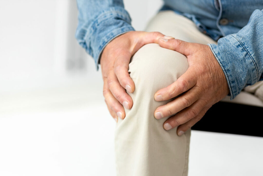 Civitas Senior Living | Man holding his knee