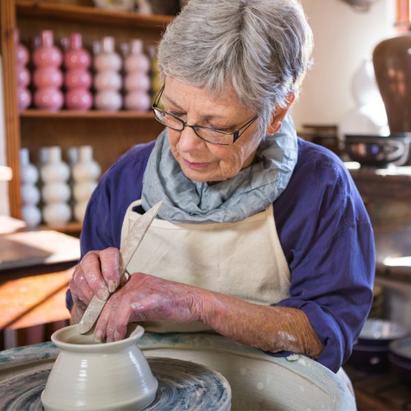 Cambridge Court | Senior woman making pottery