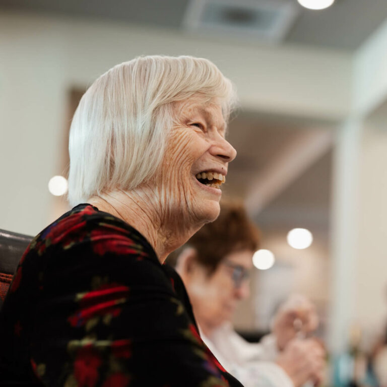 Clear Fork | Smiling senior woman at event