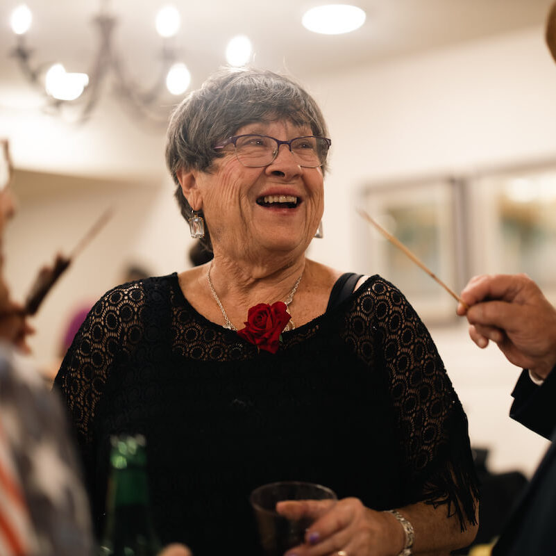 Clear Fork | Smiling senior woman dressed up at senior event