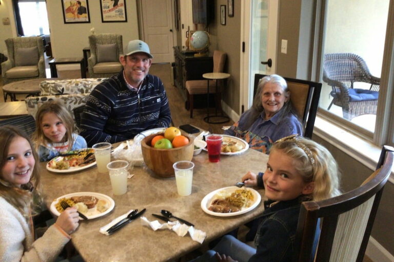 Clear Fork of Willow Park | Senior woman dining with her family