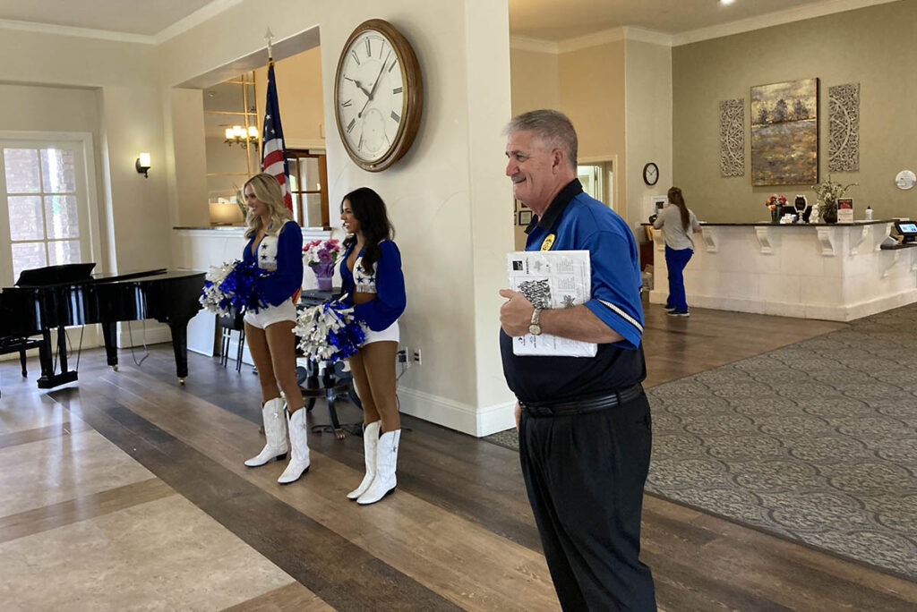 Dancing River | Dallas Cowboys cheerleaders in lobby