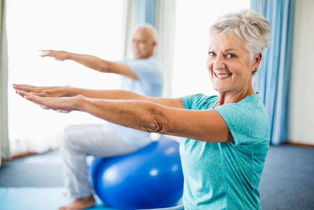 Civitas Senior Living | Seniors doing ball exercise