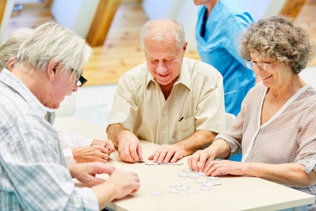 Double Creek | Round Rock nursing homes - group of seniors working on puzzle together