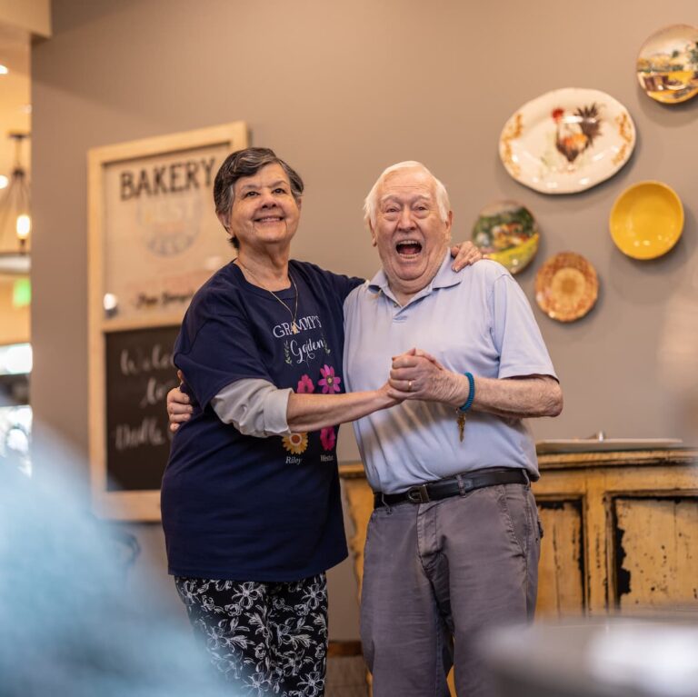 Double Creek | Seniors dancing together in activity room