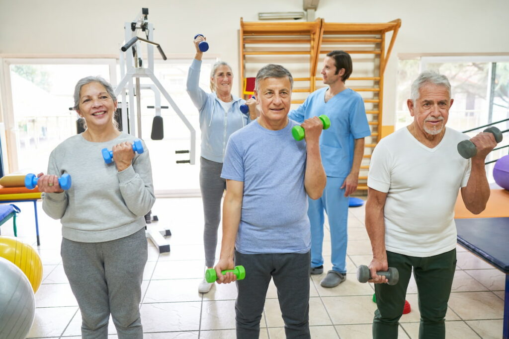 Elan Manatee | Seniors exercising in a gym