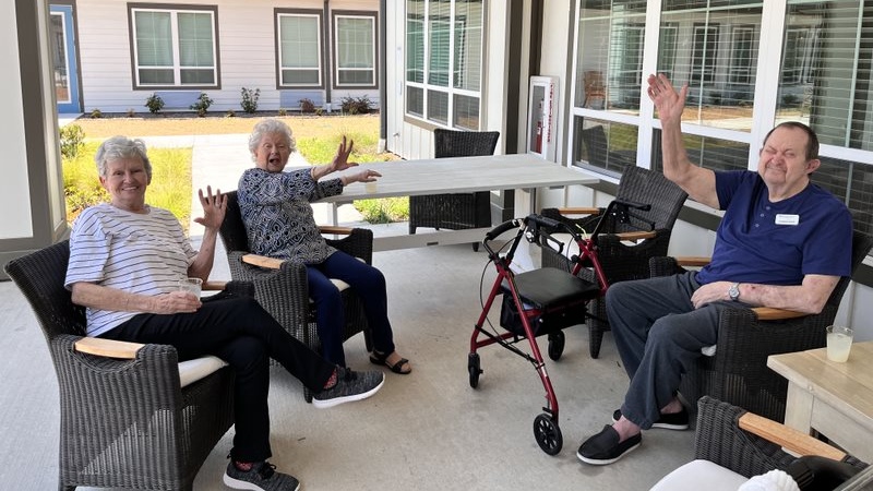 Harvest of Aledo | Senior friends sitting outside