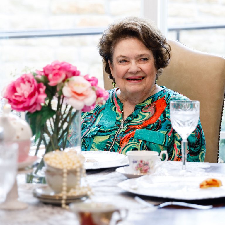 Harvest of Roanoke | Senior woman at table