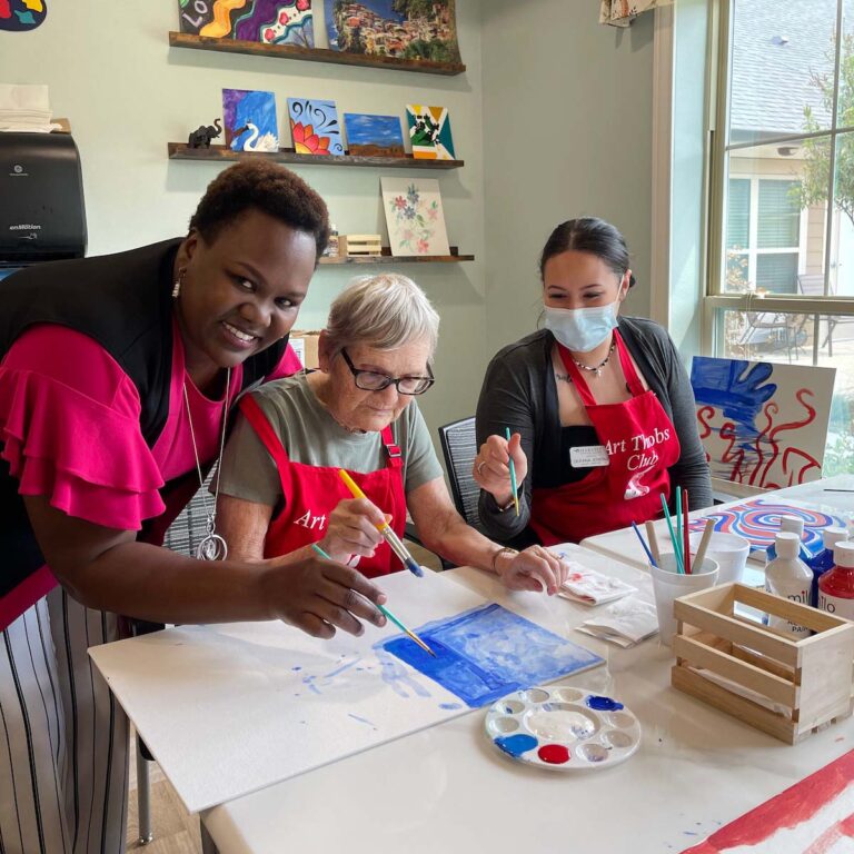 Harvest of Roanoke | Executive Director painting with residents