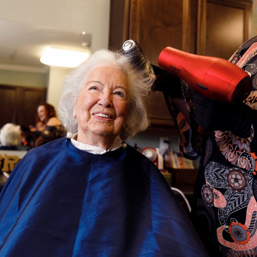 Ledgestone Senior Living | Senior woman getting her hair styled