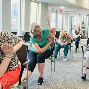 Ledgestone Senior Living | Seniors doing yoga therapy