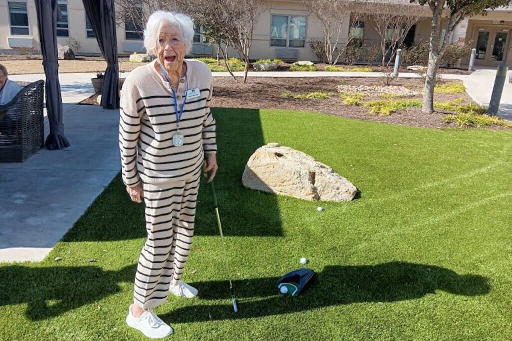 Ledgestone Senior Living | Assisted living resident on the golf course