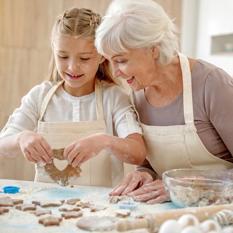 Legacy Oaks of Azle | Senior and granddaughter making cookies