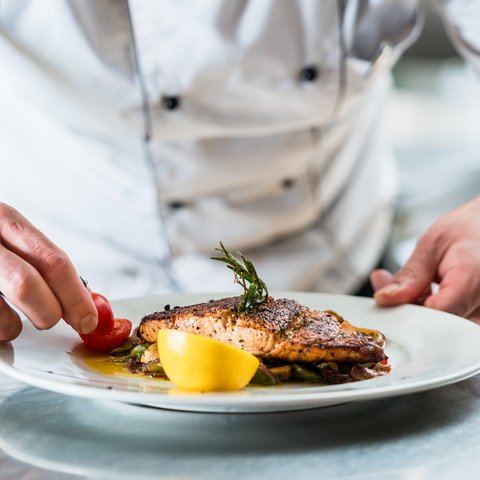 Civitas Senior Living | Chef plating a dish