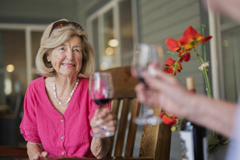 Legacy oaks of Midlothian | Senior woman having wine