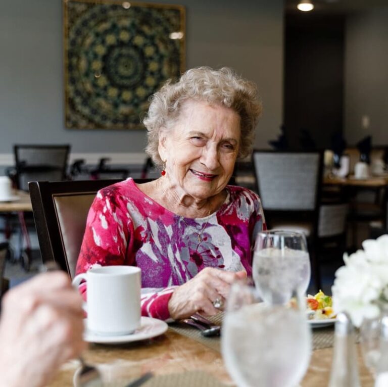 Legacy Oaks of Midlothian | Smiling senior woman in dining room
