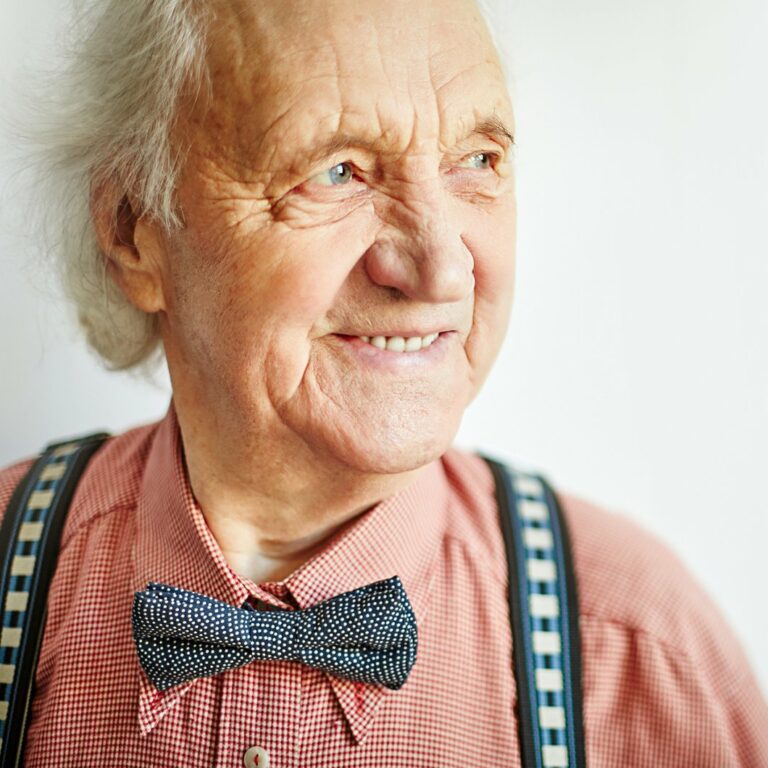 Legacy Oaks of South Austin | Senior man smiling with bowtie