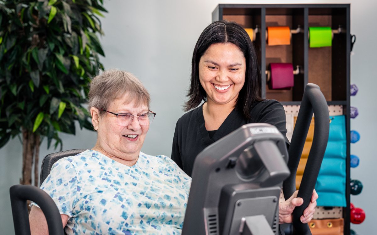 Civitas Senior Living | Senior exercising with caregiver