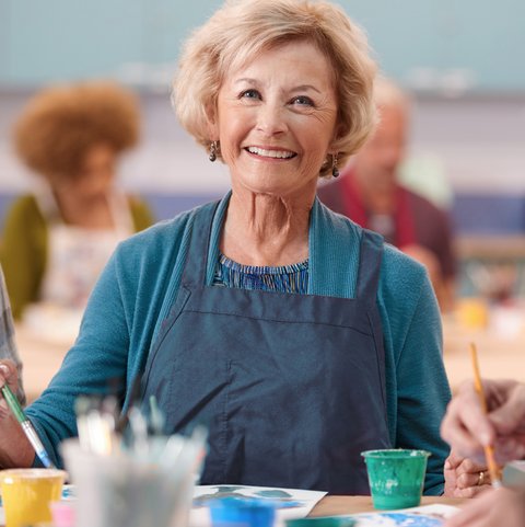Stone Creek of Copperfield | Senior woman painting