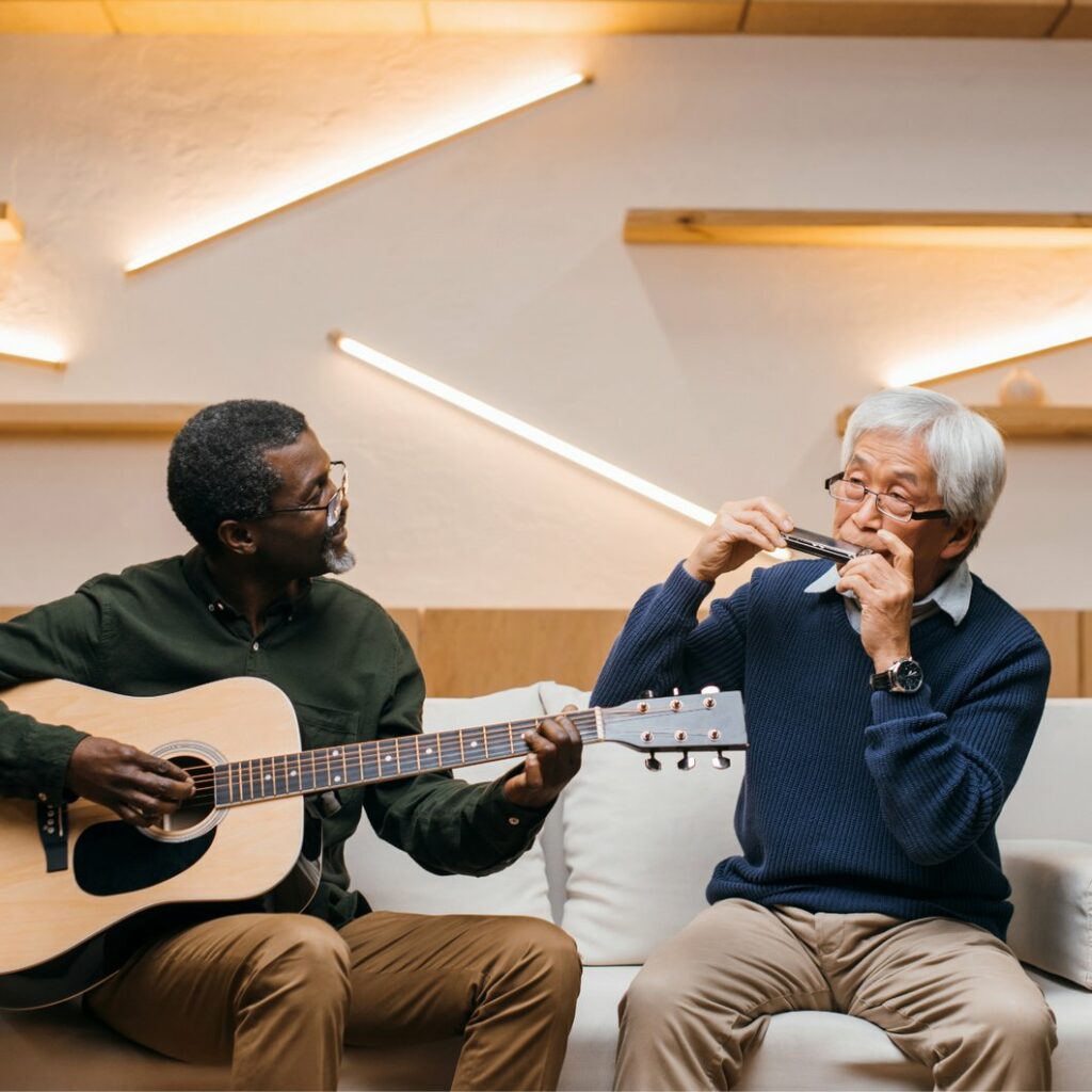 Stone Creek of Copperfield | Senior men playing musical instruments