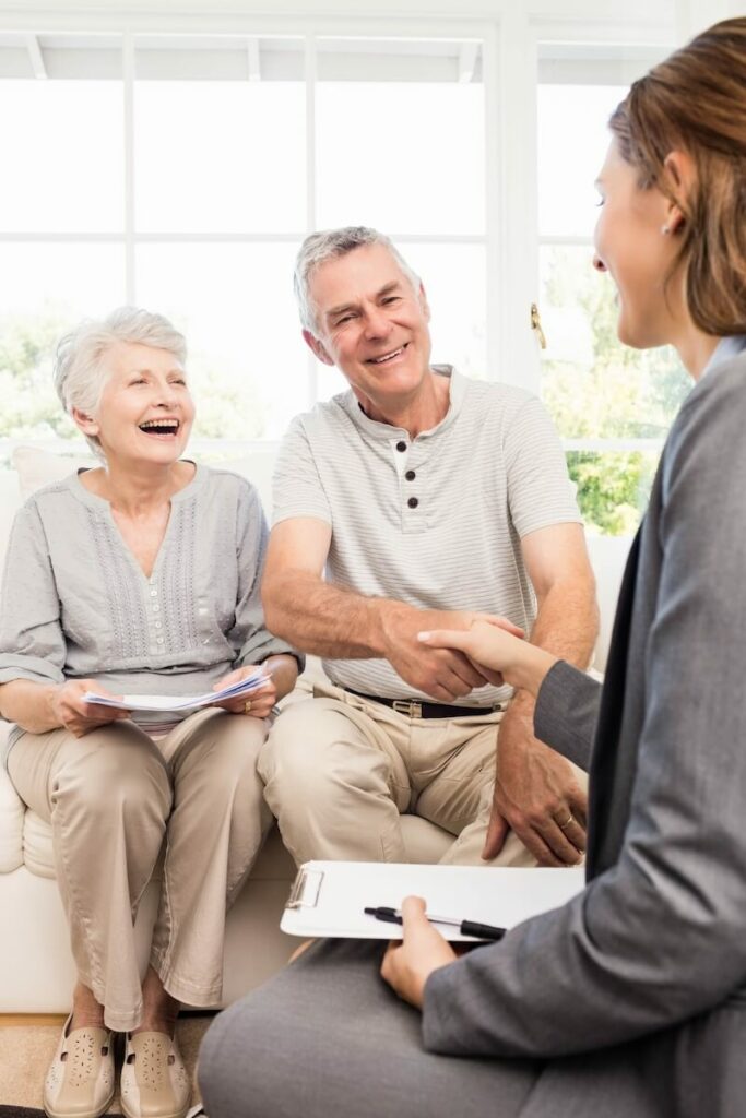 StoneCreek of Copperfield | happy senior couple talking to a senior living expert