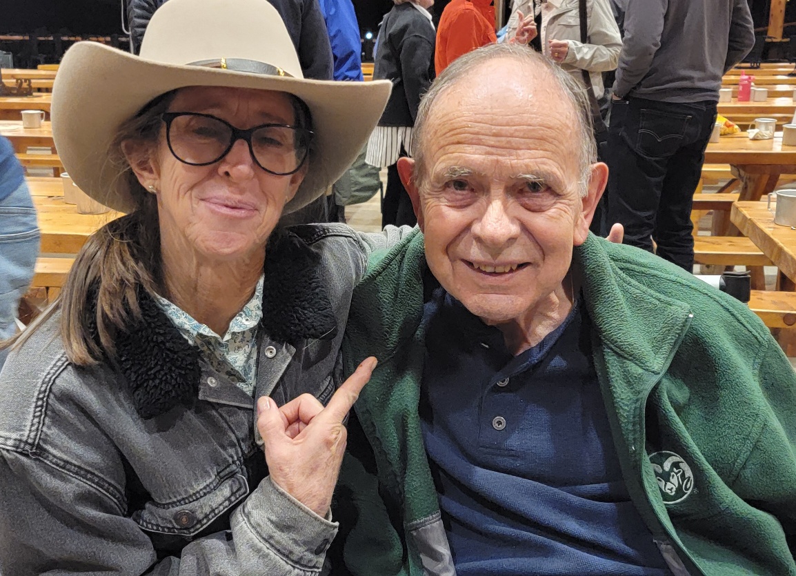StoneCreek of Copperfield | Senior man smiling for picture with woman in glasses and cowboy hat