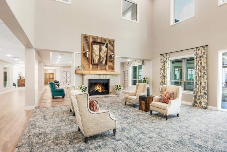 StoneCreek of Copperfield | Foyer with a fireplace