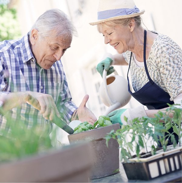 StoneCreek of Flying Horse | Senior couple gardening