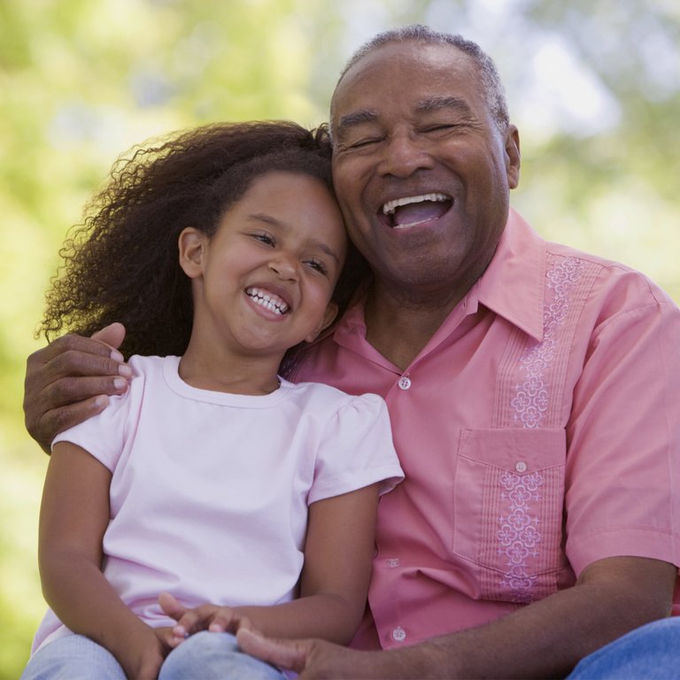 StoneCreek of Flying Horse | Senior man laughing with granddaughter