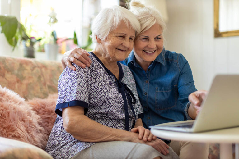 Civitas Senior Living | Two senior women looking at laptop